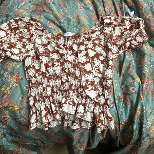 Three beautiful floral blouses